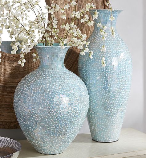 Pier 1's spectacular Aqua Mosaic Vases, clad in glittering hand-placed glass tiles, bring a sun-kissed ocean vibe to your home or beach cottage. They make dazzling displays on their own, or fill them with faux florals or dried sea grasses for extra impact. Ocean Decorations, Mosaic Vases, Floor Vases, Vase Deco, Mosaic Vase, Pool Life, House Deco, Room Styles, Vegas Style