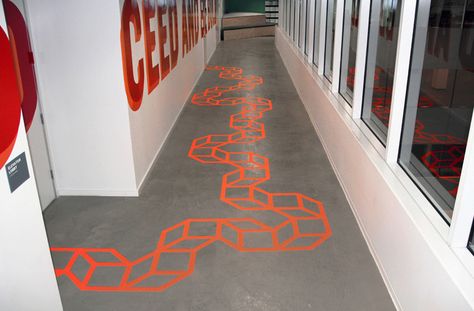 Facebook commissioned Aakash Nihalani to create geometric paper tape installations in their New York City office. We previously posted on Aakash Nihalani i Office Graphics, Tape Installation, Floor Tape, New York Office, City Office, Corporate Interiors, Tape Art, Floor Decal, Art Installation