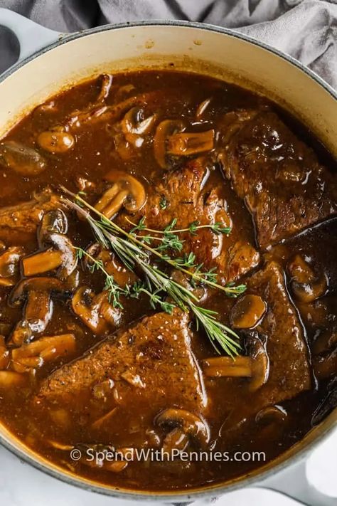 Just 20 minutes of prep time is all it takes to cook this tasty Round Steak and Gravy recipe! Then it's slow-cooked in the oven until fork-tender. #spendwithpennies #roundsteakandgravy #steakandgravy #entree #recipe #classic #stovetop #tender #mushrooms #onions Round Top Steak Recipes, Top Steak Recipes, French Beef Stew Recipe, Tenderized Round Steak, Easy Beef Recipes, French Beef Stew, Broccoli Pasta Recipe, Easy Beef And Broccoli, Round Steak Recipes