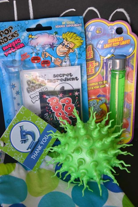 Mad Scientist Party | CatchMyParty.com Scientist Birthday Party Ideas, Mad Scientist Birthday Party, Science Party Favors, Science Themed Party, Science Birthday Party Ideas, Scientist Birthday Party, Mad Scientist Birthday, Party Rooms, Mad Science Party