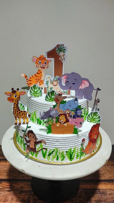 Cake for kids based on jungle theam. 1st birthday cake🥰 Cartoon Theme Cake For Boys, Jungle Theme Cake Boys, Safari Cake Design, Cartoon Cakes For Kids, Jungle Cake Ideas, Jungle Theme Birthday Cake, Jungle Theme Cake, Cakes Without Fondant, Jungle Birthday Cakes