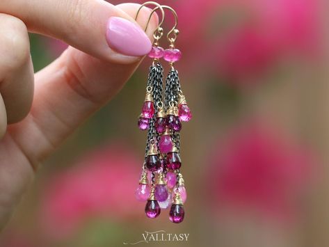 The Pink Lady Earrings - Pink Sapphire, Pink Tourmaline and Rhodolite Garnet Tassel Earrings, Mixed Metal Earrings This intricate pair of earrings features breathtakingly gorgeous precious gemstone drops in pink-purple color palette. They sparkle and dangle with every move! Lightweight, elegant with a twist, these earrings look like a colorful waterfall on the ears. The black silver chains emphasize the glory of the gems and gold accents add lots of chic. The design is very modern and lightweight. Exceptionally attractive earrings that combine beautiful gems and elegant design! ⭐ DETAILS: ✔️ Length including french earwires: 2.5" (~6.4 cm) ✔️ Metals (as shown in the photos): High quality Gold Filled and Oxidized Silver Chains Additional variations for the metal (you can change in the drop-