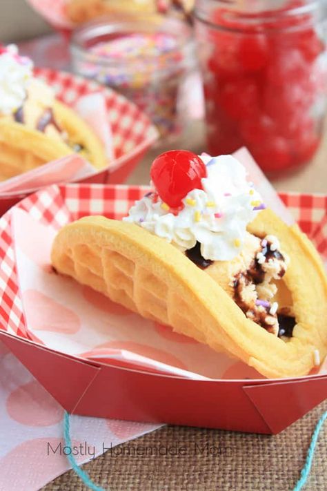 A finished ice cream taco in a paper serving bowl topped with whipped cream and a cherry Ice Cream Tacos, Cream Tacos, Waffle Taco, Ice Cream Station, Ice Cream Taco, Dessert Taco, Ice Cream Kids, Waffle Ice Cream, Frozen Waffles