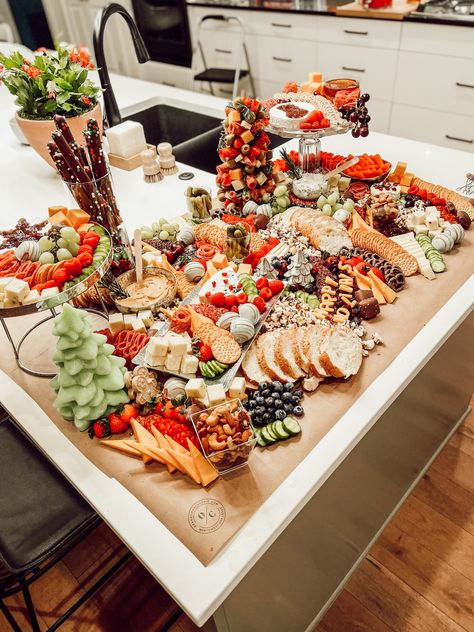 Christmas Charcuterie for a Jolly Holiday Dinner | Ozark Charcuterie | Enjoy a Christmas-themed charcuterie spread at your Holiday Dinner! Create a cozy and festive atmosphere for your gathering with tasty charcuterie boards, perfect for sharing during this merry season. Charcuterie provides a delicious and adorable feast for family and friends to enjoy. #charcuterie #charcuterieboard #grazetable #charcuteriecup #smallbusiness #christmascharcuterie #christmas Christmas Charcuterie Spread, Charcuterie Tables, Holiday Charcuterie, Christmas Charcuterie, Charcuterie Spread, Bar Catering, Grazing Tables, Jolly Holiday, Birthday Party Celebration