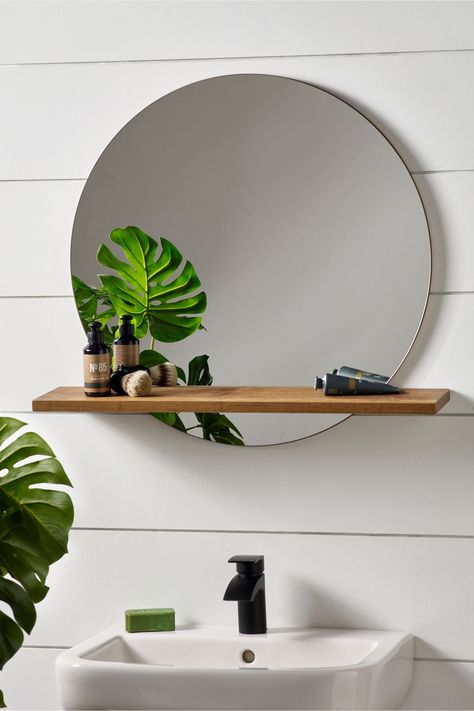 Wall mirror with shelf