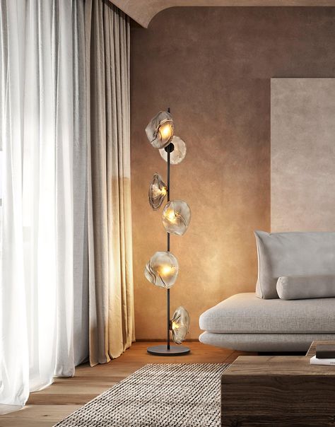 Are you looking for a one-of-a-kind floor lamp to be the focal point of your living room? Take a look at this stunning floor lamp with handcrafted glass lamp shades either in clear or smokey gray. The Glass Petal Floor Lamp features stylish melt lava-like lamp shades that will serve as an art piece in your home. 
 If you have any questions about our products, please contact us and we will get back to you within 24 hours. 
 Product Size 
 3 heads Size: Dia 35cm x H 180cm /  13.8 x H 70.9 
 
 6 he Glass Lamp Shades, Luxury Sofa Living Room, Standing Table, Glass Floor Lamp, Floor Lamps Living Room, Glass Floor, Iron Lighting, Glass Lamp Shade, Simple Lighting