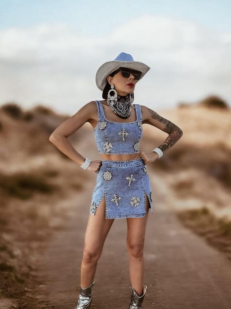 Rhinestone Diamond Embellished Western Two-Piece Cowgirl Set - The Ultimate Festival & Bachelorette Look  Step into the spotlight with this rhinestone diamond embellished western two-piece set, designed to make you shine like a true festival queen. Featuring a high-waisted western skirt and a matching rhinestone-studded bustier top, this set blends soft denim, dazzling rhinestones, and a comfortable fit, making it perfect for bachelorette parties, country concerts, festivals, or a glam cowgirl night out.  Rhinestone Diamond Embellishments: Sparkle from every angle with shimmering crystal details.  Soft & Stretchy Denim Fabric: Designed for comfort and movement while keeping its structure.  High-Waisted Western Skirt: Flattering fit that accentuates your curves with double front slit.  Bust Baddie Cowgirl Outfits, Denim Cowgirl Outfit, Space Cowboy Costume, Festival Bachelorette, Space Cowgirl Costume, Glam Cowgirl, Cowgirl Festival, Denim Rhinestone, Cowboy Carter