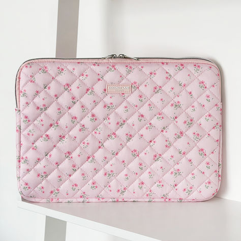 Add a pop of colour and personality to your laptop with our Quilted Ditsy Floral Pink Laptop Sleeve. Protect your device in style and make a statement wherever you go. Say goodbye to boring plain sleeves and hello to playful fashion! Playful Fashion, Pink Laptop, Ditsy Floral, Laptop Sleeve, Laptop Sleeves, Say Goodbye, Soft Material, Color Pop, In Style