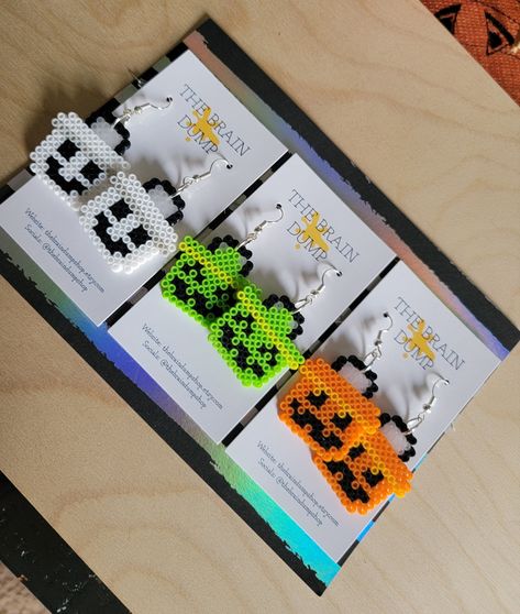 Halloween Cookie Perler Bead, Peeler Bead Flower, Melty Bead Earrings, Halloween Perler Patterns, Ghostface Perler Beads, Perler Bead Earrings Patterns, Perler Bead Jewelry, Halloween Perler Bead Patterns, Halloween Perler Beads