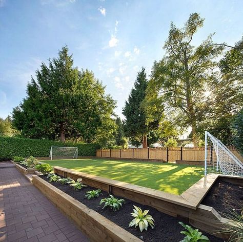 Retro revival home completely transformed in British Columbia Playground Landscaping, Backyard Sports, Mini Soccer, Large Backyard Landscaping, Patio Grande, No Grass Backyard, Diy Playground, Big Backyard, Outdoor Remodel