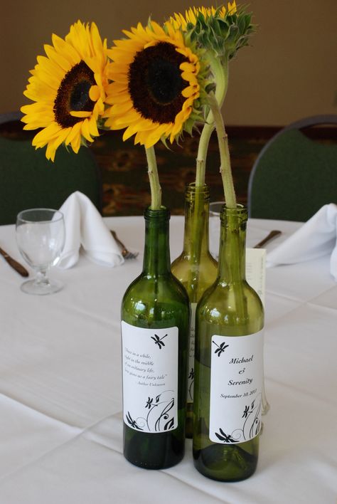 Great DIY way to cut cost at your wedding.  We saved all these wine bottles, made labels and put in the happy sunflowers.  Peeling all the wine labels off was a pain but so worth it. Wine Centerpieces, Welcome Flowers, How To Make Labels, A Bottle Of Wine, Bottle Of Wine, Wine Labels, Wine Label, Wine Bottles, The Happy