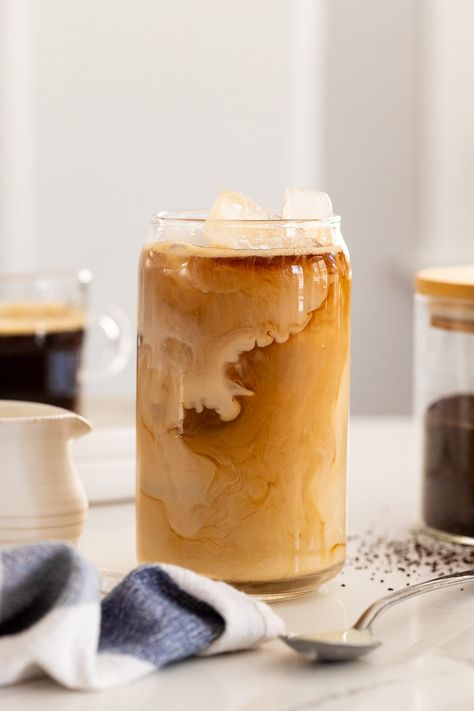 If you’ve been searching for a refreshing new way to enjoy your morning coffee, give this Iced Spanish Latte recipe a try! It’s SO EASY, only takes 3 ingredients (plus ice!) and has just the right balance of milky sweetness and rich espresso flavor. It's a slightly more mellow spin on Vietnamese iced coffee that's perfect for warm weather! Spanish Latte Recipe, Coffee Banana Bread, Vegan Sweetened Condensed Milk, Bakers Menu, Spanish Latte, Iced Latte Recipe, Spanish Coffee, Japanese Coffee, Vietnamese Iced Coffee