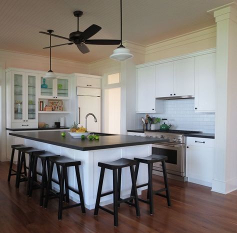 Black & White Kitchen - From Maria Killam Blog - Kitchen Cabinets are SW7006 "The lighting at night is so pretty.  Over the cabinets, underneath, and inside the glass cabinets. The appliances are integrated. And I especially love that the hood fan almost disappears, her appliances are GE Monogram." Kitchens With Ceiling Fans, Fan In Kitchen Ceiling, Ceiling Fan Above Kitchen Island, Ceiling Fan For Kitchen, Ceiling Fan Over Kitchen Island, Kitchen Fan Ideas, Kitchen With Ceiling Fan, Fan In Kitchen, Ceiling Fan Kitchen