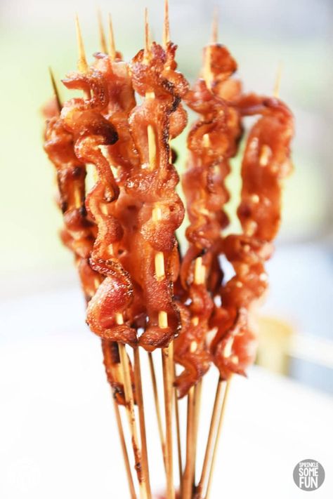 Bacon skewers are a tasty appetizer that is sure to please any bacon lover!   These are a great treat to make for holiday entertaining.  Bacon skewers are perfect for serving at parties or at any meal where you want bacon (which is every meal, right?). #appetizer #baconskewer #holidayappetizer #easyappetizer #bacon #sweetbacon #baconcandy #brownsugarbacon #christmasappetizer #fallappetizer #brownsugarbaconskewer #brunch #brunchrecipe #baconrecipe #recipeswithbacon #recipe Mini Waffle Brunch Ideas, Bridal Shower Brunch Casseroles, Bacon Breakfast Appetizers, Brunch Recipes Fancy, Farm Themed Brunch Food, Brunch Pastry Board, Big Sandwiches Parties Food, Finger Foods For Brunch Party, Brie Brunch Recipes