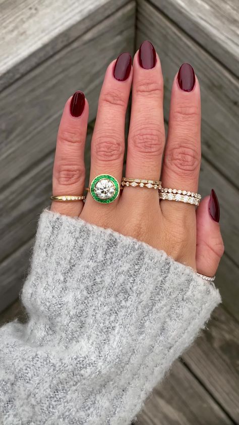 If you want old world charm with touches of deep green throughout the design - something fit for royalty - then you have found it in our Andora. We sourced a gorgeous 2.50ct brilliant round diamond for the center and sprinkled green emeralds that were custom cut to fit each and every nook and cranny of this beautiful halo ring. Approx Band Width (mm): 1.80mm Setting Diamond Quality (side stones): Colorless and VS clarity Approx Setting Total Carat Weight (side stones): 0.45 tcw Approx Production Time: 3-6 months Setting only cost below: 14k Rose, White, or Yellow Gold setting $9,850 18k Rose, White, or Yellow Gold setting $10,100 Platinum setting $10,350 Diamond With Emerald Halo, Six Stone Diamond Ring, Dream Engagement Rings Dream Engagement Rings Unique, Round Diamond With Halo, Bezel Pear Engagement Ring, Engagement Ring 2024, Diamond And Emerald Engagement Ring, Round Emerald Ring, Round Sapphire Ring