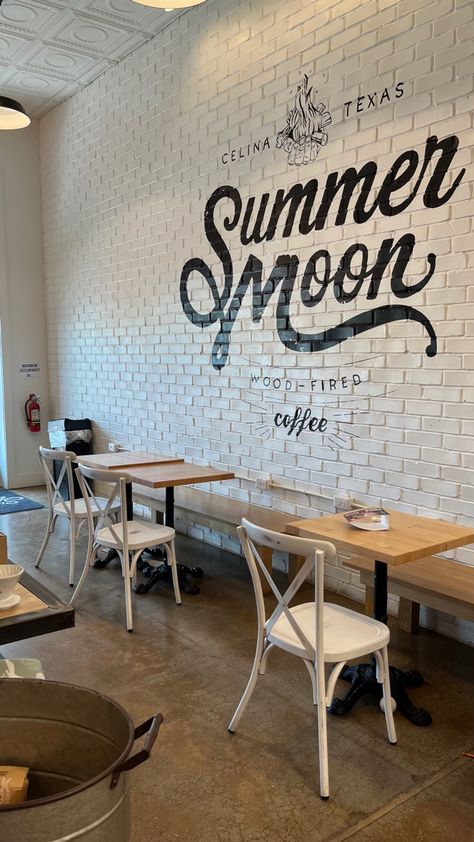 Coffee Shop Outside Sign, Light Coffee Shop Aesthetic, Accent Wall Coffee Shop, Black White Coffee Shop, Cafe Setup Ideas, Magnolia Coffee Shop, Summer Moon Coffee, Hipster Coffee Shop Aesthetic, Tea Shop Ideas Business