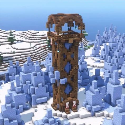 If you're looking for a nice watch tower build in Minecraft, make sure this beautiful creation is on your watch list! This Ice Spike Watch Tower in Minecraft features a well-structured tower with a very pleasing exterior design from the base up to the highest point of this tower build. You can also use this as a starter house because of its many possible features. So better check it out now. Tower In Minecraft, Minecraft World Ideas, House In Minecraft, Build In Minecraft, Starter House, Minecraft House Ideas, Nice Watch, Diy Minecraft, Amazing Minecraft