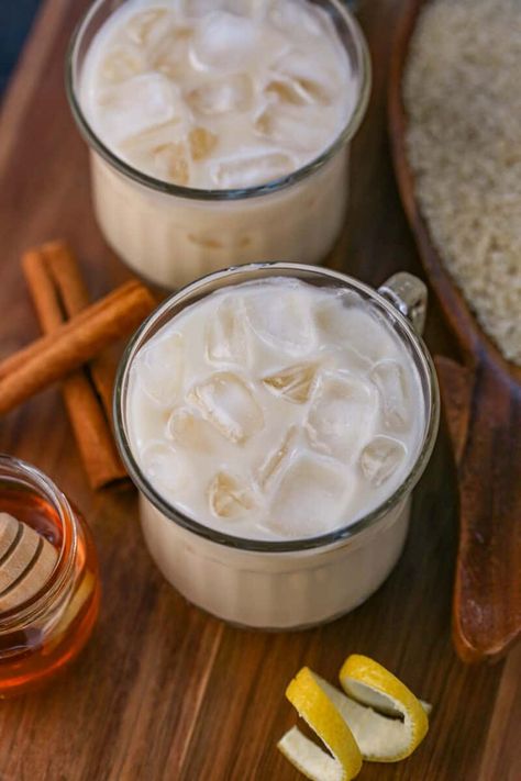 This Puerto Rican horchata recipe is made with sesame seeds to create a delicate sweet flavor that's enhanced with cinnamon, spice, milk, and a hint of lemon! This is the perfect spring recipe for ice cold drinks! Puerto Rican Drinks, Lemon Flan Recipe, Easy Horchata Recipe, How To Make Horchata, Homemade Horchata, Ice Cold Drinks, Horchata Recipe, Cold Drinks Recipes, Latin Recipes