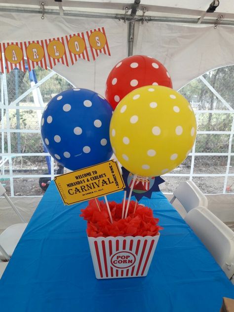 Carnival birthday party centerpiece decorayion DIY by me! Circus Birthday Party Centerpieces, Carnival Party Theme Decorations, Carnival Table Decorations Centerpieces, 1st Bday Carnival Theme, Circus Birthday Centerpieces, Diy Circus Birthday Party, Circus Centerpieces Diy, Easy Carnival Decorations, Carnival Themed 1st Birthday Party