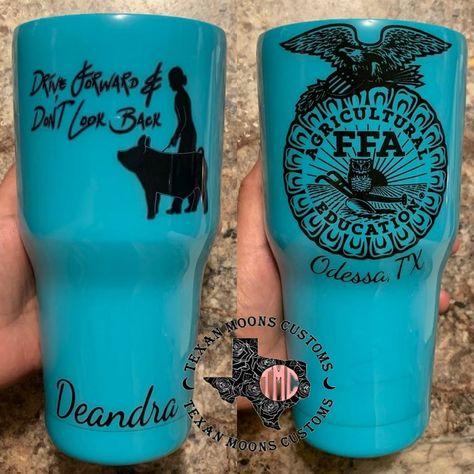 Drive Forward and Don't Look Back, FFA, The cups are sealed with FDA approved epoxy which prevents the paint, glitter and decals from scratching or peeling off. They are double wall stainless steel, so they will keep beverages cold or hot for hours. Message us on Facebook or Instagram @Texan Moons Customs Ffa Reporter Ideas, Ffa Tumbler Ideas, Ffa Tumbler Cups, Ffa Tumbler, Ffa Crafts, Western Cups, Ffa Fundraiser, Ffa Ideas, Livestock Showing