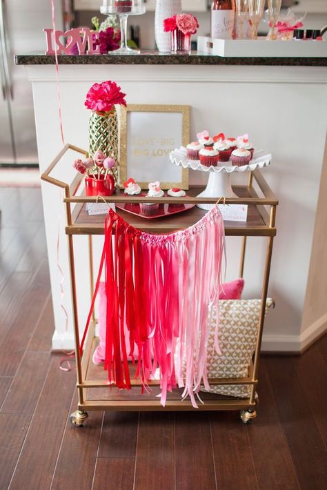 colorful Valentine bar cart styling with an ombre tassel bunting and hot pink blooms Tea Cart Decor, Treat Cart, Acrylic Bar Cart, Fete Ideas, Valentines Surprise, Party Hosting, Pink Bar, Drink Cart, Pillow Party