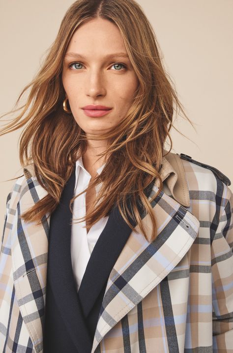 A modern update to the classic trench, this tailored topper has you covered. Notched lapel. Long sleeves with button tab cuffs. Double breasted button front. Shoulder epaulettes with button closure. Self tie belt. Angled front welt pockets. Back storm flap with inverted pleat. Back vent. Plaid Trench Coat, Shoulder Epaulettes, Anne Taylor, Soft Autumn, 2024 Vision, Belt Tying, Tie Belt, Welt Pockets, Effortless Style