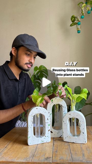 Reuse Bottles Glass Diy, Glass Test Tube Crafts, How To Break Glass For Crafts, Test Tube Decor Ideas, Stands For Plants Pots, Reusing Glass Bottles, Test Tube Art, White Cement Diy Craft, Reuse Glass Bottles