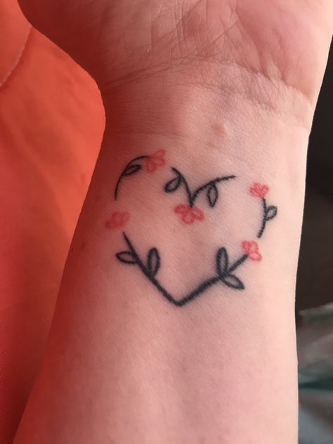 Small heart wrist tattoo, one flower for each daughter ❤️ Heart Wrist Tattoos For Women Unique, Small Heart Wrist Tattoo, Open Heart Tattoo, Small Heart Tattoo, Heart Flower Tattoo, Small Wave Tattoo, Heart Tattoo Wrist, Tiny Heart Tattoos, Small Heart Tattoos