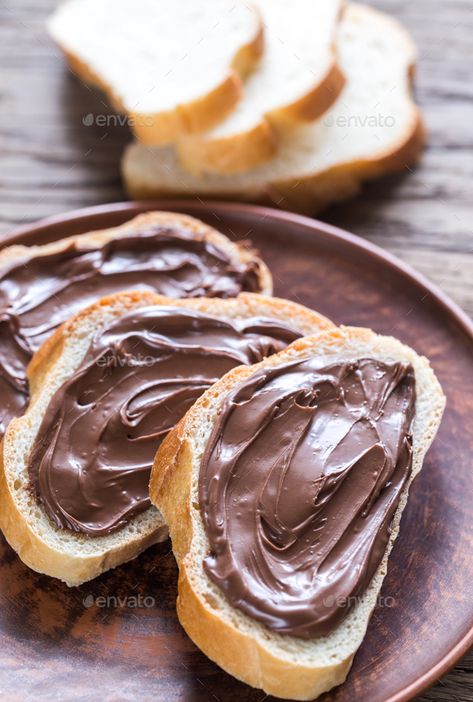 Bread with chocolate spread by Alex9500. Slices of baguette with chocolate cream #AD #spread, #chocolate, #Bread, #cream Bread With Chocolate, Bread Breakfast, Toast Toppings, Chocolate Bread, Chocolate Spread, Macro Meals, Breakfast Breads, Chocolate Cream, Healthy Ingredient