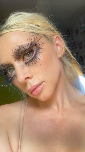 Liza Kondrevich on Instagram: "✨ Inspired by the runway makeup, I’ve created this reusable eye piece. It's easy to apply, use, and remove. ✨ • • • #makeup #makeupideas #makeupartist #runwaymakeup #rhinestonemakeup #editorialmakeup #facechartartist #lizakondrevich #falselashes #graphiceyeliner" Makeup Looks Editorial, Catwalk Makeup, Opera Theatre, Rhinestone Makeup, Theatre Makeup, Graphic Eyeliner, Runway Makeup, Face Chart, Cool Makeup Looks