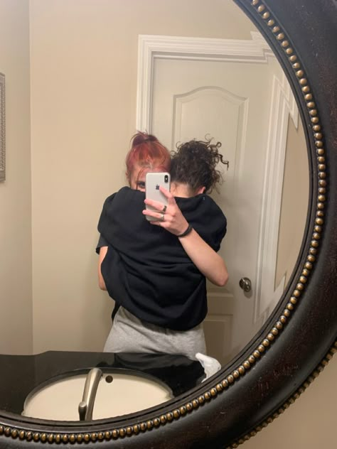 Lesbian couple hugging in a bathroom mirror. Photos To Recreate With Girlfriend, Wlw Soft Launch Aesthetic, Lesbian Photo Instagram, Date Night Lesbian Couple Goals, Pictures To Recreate With Girlfriend, Masc Fem Couple Wlw, Wlw Insta Story, Pics To Recreate With Your Girlfriend, Wlw Pics To Recreate Spicy