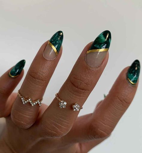 30+ Sophisticated Emerald Green Nails Design for Winter - The Mood Guide Good And Emerald Nails, Emerald And Gold Almond Nails, Emerald Green And Gold Nails Acrylic Almond, Emerald Green Almond Nails, Emerald Green Nails Design, Emerald Green Nails Gold Foil, Emerald Marble Nails, Winter Nails Green Gold, Green Almond Nails