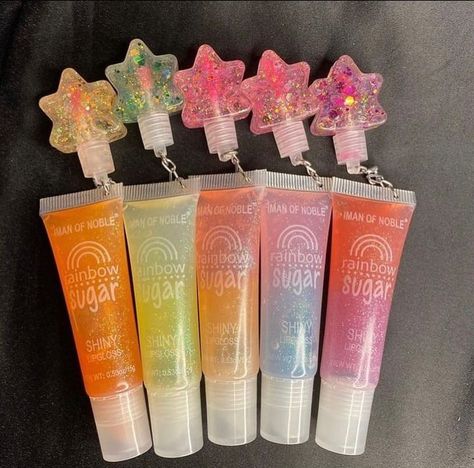 Rainbow lip gloss Lip Gloss Cute Tubes, Rainbow Lip Gloss, Rainbow Lips, 90s Wallpaper, Paw Patrol Toys, Lip Gloss Collection, Makeup Items, Lip Balms, Lip Glow