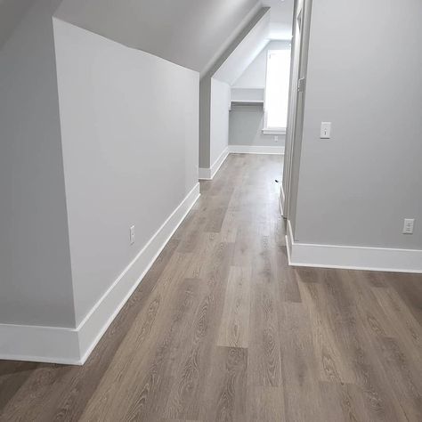 Beautiful Grey Luxury Vinyl Planks. Completely waterproof floors, scratch resistant, fade resistant, that will last you up to a lifetime! Vinyl Flooring And Wall Color, Flooring With Gray Walls, Floors With Grey Walls, Flooring With Grey Walls, Back House Ideas, Grey Walls White Trim, Vinyl Flooring Bedroom, Light Grey Flooring, Duplex Ideas