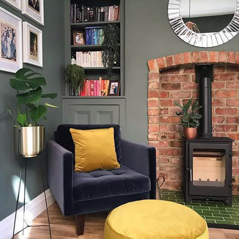 We love this snug in this Edwardian home with the deep green walls and exposed brick fireplace. In the home of the_elms_project1906 on Instagram. Green Snug, Deep Green Walls, Exposed Brick Fireplaces, Wood Burning Stoves Living Room, Log Burner Living Room, Brick Living Room, Snug Room, Victorian Living Room, Cosy Living Room