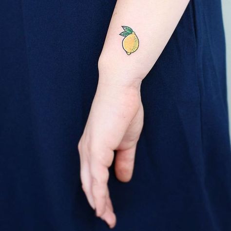 One more shot of a cute little lemon!  #tattoo #tattoos #tattoosofinstagram #inkstagram #lemon #lemontattoo #fruittattoo #cutetattoo #tinytattoo #torontotattoo #torontotattooartist #tattoopeopletoronto #tattoopeople Maori Tattoo Frau, Lemon Tattoo, Peach Tattoo, Spiritual Tattoo, Fruit Tattoo, Maori Tattoos, Petit Tattoo, Polynesian Tattoo Designs, Tattoo People