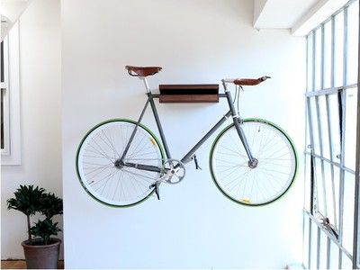 10 Ways To Hang Your Bike On The Wall Like A Work Of Art Hanging Bike Rack, Bike Storage Apartment, Indoor Bike Rack, Indoor Bike Storage, Space Saving Apartment, Bike Shelf, Bike Storage Solutions, Bike Hanger, Cheap Wall Art