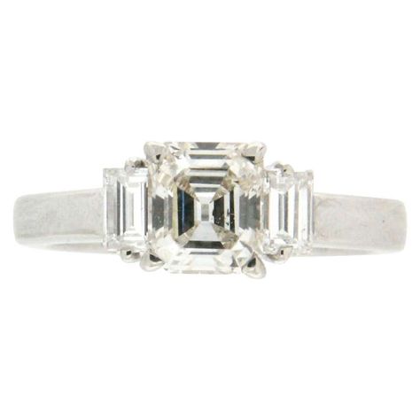 For Sale on 1stdibs - For any problems related to some materials contained in the items that do not allow shipping and require specific documents that require a particular period, Engagement Rings Emerald Cut, Rings Emerald Cut, Engagement Rings Emerald, White Diamond Rings Engagement, Rings Emerald, Baguette Engagement Ring, Contemporary Engagement Rings, Emerald Cut Diamond Engagement, Diamond Baguette