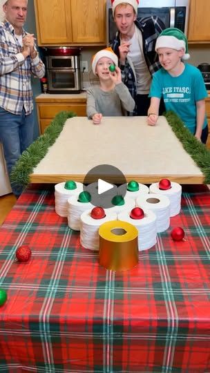 6M views · 22K reactions | The Christmas Toilet Paper Challenge 🧻 | The Christmas Toilet Paper Challenge 🧻

Dad, kids, and the family play funny Christmas party game where they roll ornaments into rolls of toilet paper... | By Benson Crew | Okay, roll the ornament. Oh, he
missed. My turn. My turn. Oh, that's a miss. Come on. Go for
it because you get it. You got it. Oh, you got this one which
means you get ten dollars. Loucher. Oh, that's a miss.
Come on. Oh, that's a miss. Go for it. Go for it. Oh, you got
this one. You got $50. Oh, no. Alright, your turn. Go for it.
Oh, it's a miss. Hey, guys. You want to get the golden one
because it is a special prize. Golden Toilet Paper gets a
special one. Oh, no. Come on. Get one. Oh, come on. Come on.
Come on. Hey, you got this one which is a McD Christmas Table Games Families, Toilet Paper Roll Games, Christmas Plinko Game, Plinko Game Ideas, Chick Fil A Gift Card, Christmas Game Prizes, Christmas Minute To Win It Games, Reindeer Games Christmas Party, Toilet Paper Games