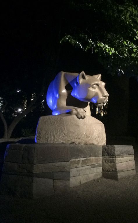 Bathed in blue, the Nittany Lion keeps watch of Penn State at night. Penn State Acceptance Letter, Penn State Crafts, Penn State College, College Core, State Crafts, Penn State Football, Pennsylvania State University, Acceptance Letter, Penn State University