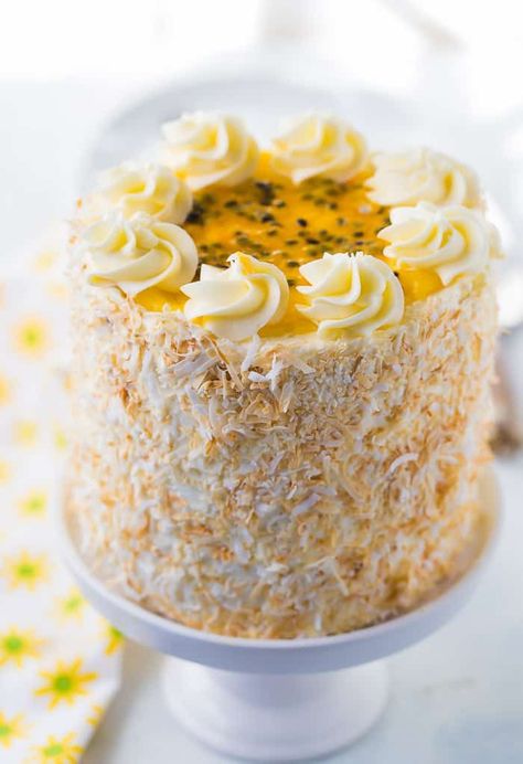 A tropical delight, this passionfruit coconut layer cake is bursting with the sweet and tart flavors of coconut and passionfruit. Coconut Cake Design Ideas, Coconut Cake Design, Coconut Cake Decoration Ideas, Coconut Wedding Cake, Passion Fruit Filling, Coconut Birthday Cake, Coconut Cake Decoration, Coconut Layer Cake, Baking Activities