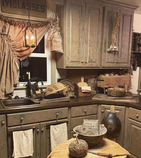 Allie Sosnoski on Instagram: “I know I’ve shared before that we gave our kitchen cabinets and countertops a makeover with @caromalcolours paints, but I don’t think I…” Primitive Cabinets Kitchen, Primitive Kitchen Cabinets, Prim Kitchen, Colonial Kitchens, Kitchen Soffit, Primitive Kitchens, Cupboard Paint, Primitive Cabinets, Primitive Living