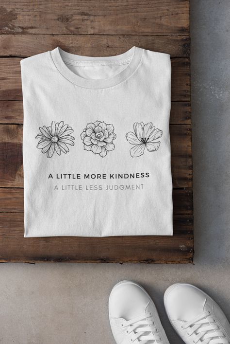 A little more kindness, a little less judgement. #kind #kindess #kindness quotes #bekind #positivity quotes #kindness t-shirt #kindness tshirt #positivevibes #positive #positivity #tshirt #t-shirt #printondemand Minimal Tshirt Design Graphics, Trending T Shirts For Women, Positive Tshirt Ideas, Tshirt Trends 2024, Tshirts For Women Graphic Tees, Tshirt Applique, Minimalist Tshirt Design, Quotes Kindness, Tshirt Quotes