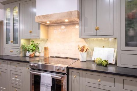 Jenn splashed out (to the tune of $2,200) to create a backsplash the Jardines would love. “The charm is just packed in this little tile! It’s imperfect, it has really messy grout lines, which I love, and I think it has that kind of vintage old charm that Greg and Alicia gravitate to.” Her instinct was spot-on — and her best friends fell in love with their house all over again. No Demo Reno Kitchen, No Demo Reno Hgtv, Jenn Todryk, No Demo Reno, Kim Wolfe, Reno Kitchen, Living Room Lighting Design, Hgtv Kitchens, House Star