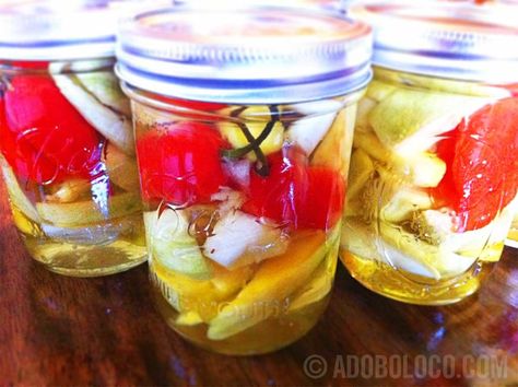 Spicy Pickled Mango.  I had this once at my cousins lake i hope this is it. Ive looked all over for a recipe! Mmmm sooo spicy and sweet but sooooo damn good! Pickled Habanero Peppers, Canning Ghost Peppers, Ghost Pepper Pickles, Sweet Pickled Habanero Peppers, Pineapple Ghost Pepper Hot Sauce, Pickle Mango Recipe, Pickled Mango, Best Pickles, Ghost Peppers