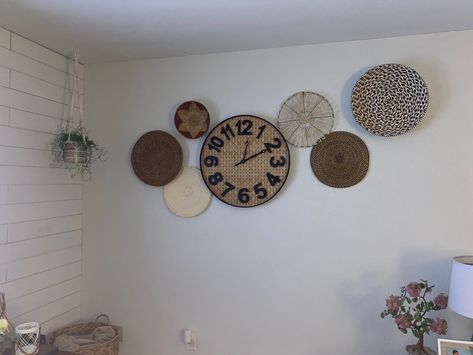 mix and match basket wall. clock basket from hobby lobby Basket Wall With Clock, Wicker Plates On Wall, Wall With Clock, Boho Dining Room, Boho Basket, African Wall Baskets, Macrame Plant Hanger Tutorial, Staircase Decor, Kitchen Dinning Room