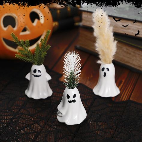 PRICES MAY VARY. Halloween Ghost Mini Vases: Add a touch of whimsy and charm to your space with our ghost mini vase set. This set includes 3 mini ghost vases, each featuring a unique design and expression, adding personality to your home decor Suitable Size & Easy to Use: With dimensions measuring approx. 2.5'' in width and 2.9'' in height, these mini vases are perfect for holding a few dried flowers. Each vase has one hole in the top designed for this purpose, allowing you to create delightful Ghost Vase, Halloween Vase, Gothic Gifts, Mini Vase, Vase Centerpieces, Vase Set, Ceramic Vases, Ceramic Clay, Tiered Tray