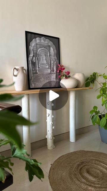 Meenakshi | Lifestyle Blogger on Instagram: "Finaaaally…DIY’d this console table 

Have been hatching these cardboard tubes for close to 9 months now …. And this console table has been on my mind ever since 

It started out to be an all white table with just a ply board…. But something didn’t look right

So after the initial prepping of the cardboard with a mixture of equal parts white cement and wall putty I stepped out to get a 5’x10”x1” pinewood plank… and asked the kind man to cut it as shown

There was a second round of cement on those tubes and then sealant spray Matt lacquer from cosmos 

The pinewood needed sanding with 120 and 150 grit paper 
Wiped it down thoroughly with a damp cloth 
Next it was time to attach the tubes to the plank… 

Got liquid nails from @acehardware on my tr Diy Under Tv Table, Diy Entry Table, Ply Board, Cement Table, White Cement, Liquid Nails, Concrete Wood, Cardboard Tubes, Entry Table