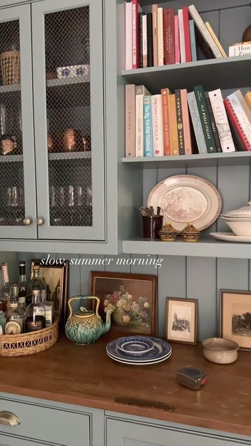 Corinne | Home | Design | Probably antiquing on Instagram: "…and always a measuring tape on the counters. happy friday friends! 🤎  kitchen, kitchen decor, shelf styling, traditional home, Nancy Meyers interiors, slow living, slow moments, cottage core, cozy home #nancymeyers #traditionalhome #cottagestyle #kitchenshelves" Nancy Meyers Interiors, Traditional Cottage Decor, Kitchen Hutch Decor, Cottage Kitchen Shelves, Cozy Traditional Home, Cottage Core Interior, Slow Moments, Kitchen Bookshelf, Kitchen Shelf Styling