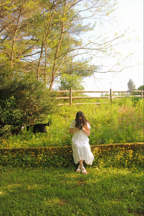 Cottage core, cottagecore, dog, black and white, color, vintage, redhead, ginger, brown, hair, long, medium, style, flowy, dress, white, wedding, linen, cotton, flower, flowers, yellow, green, blue, trees, grass, lush, field, cows, farm, core, aesthetic, photoshoot, idea, ideas, friend, friends, album, cover, art, indie, woman, girl, female, empowerment, femininity, meadow, crouch, standing, pose, sit, sitting, soft, blurry, clear, lens, blur, focus, pretty, beautiful, book, camera, antique, old Cottagecore Dog, Ginger Brown Hair, Cottagecore Photoshoot, Brown Hair Long, Dog Black And White, Vintage Redhead, Farm Core, Cows Farm, Lens Blur